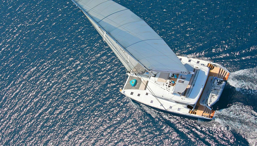 Charter the Spacious Catamaran 570: Experience Leisure in Water 5 book2sail-catamaran 570 sailing