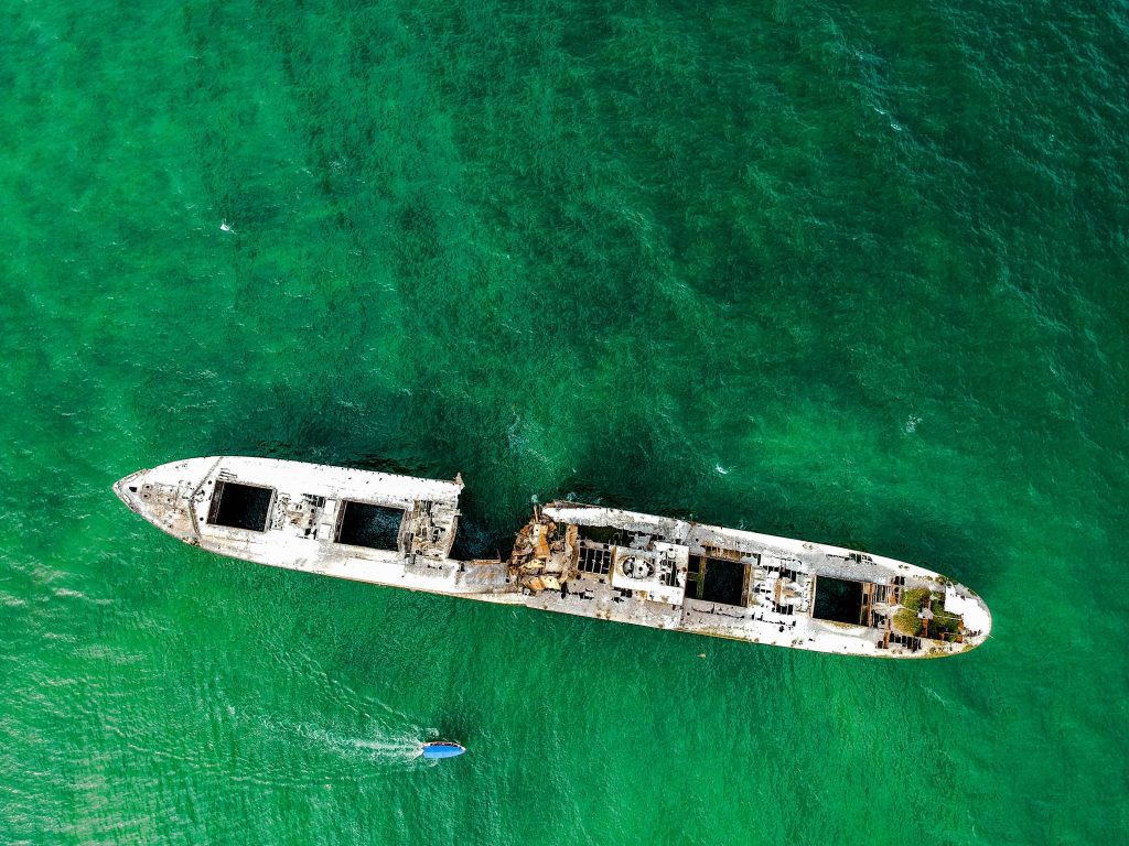 How do You Get Sunken Treasure? – Take Notes Mateys 3 book2sail-top view photo of abandoned white ship on sea 3520249 2048x1536 1